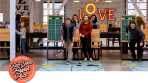 People playing shuffleboard