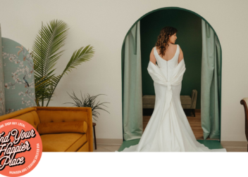 a bride stands in an entry of a dressing room