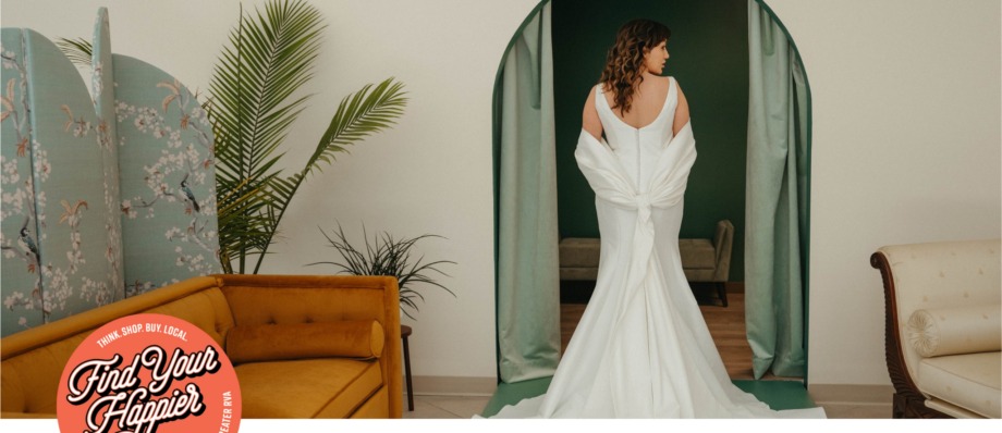 a bride stands in an entry of a dressing room