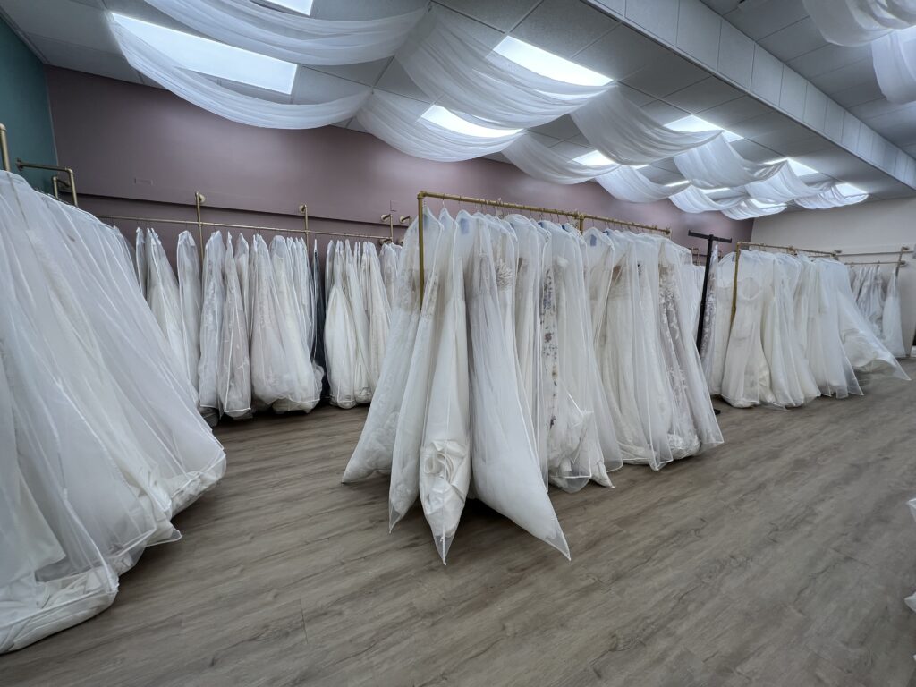 A room full of wedding dresses at Blue Sage Bridal