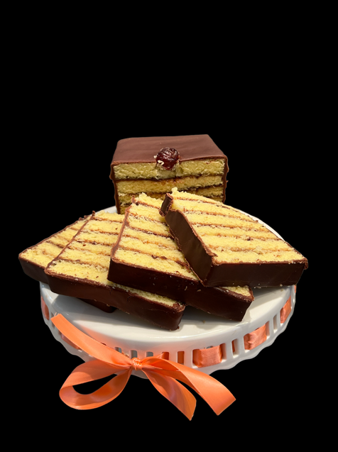 A six layer chocolate cake on a white pedestal in Brookland Park Richmond