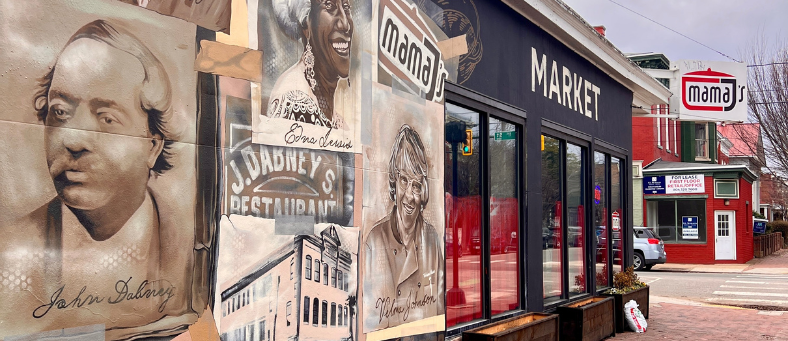 a historical mural outside Mama J's featuring prominent Black Jackson Ward figures